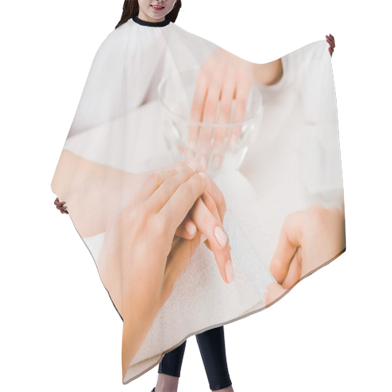 Personality  Partial View Of Manicurist Holding Female Hand And Using Nail File  Hair Cutting Cape