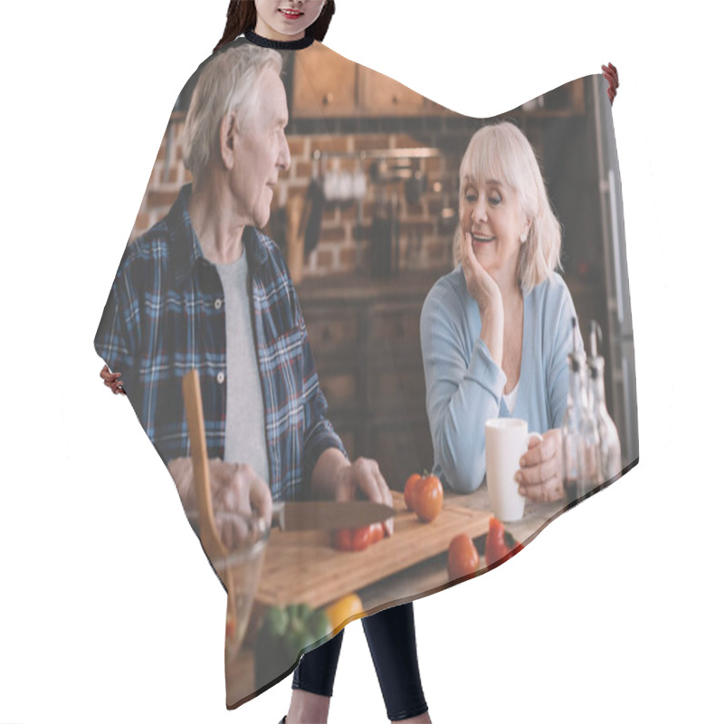 Personality  Senior Couple In Kitchen Hair Cutting Cape