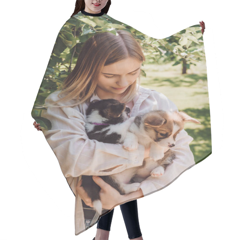 Personality  Blonde Girl Holding Cute Puppies In Garden Near Green Tree  Hair Cutting Cape