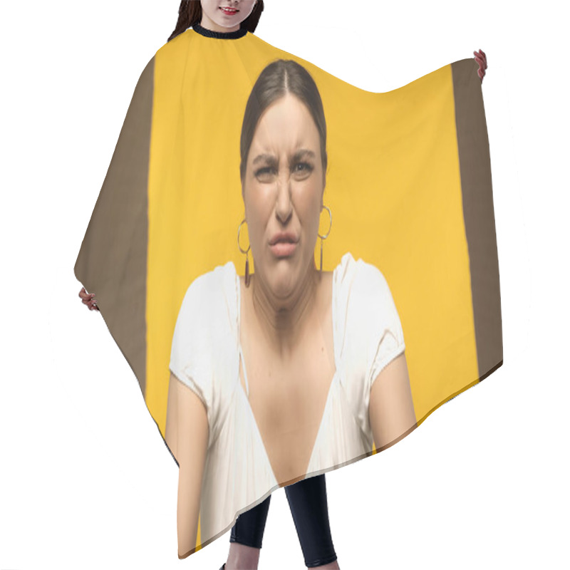 Personality  Bottom View Of Disgusted Brunette Woman Looking At Open Cardboard Box Isolated On Yellow  Hair Cutting Cape