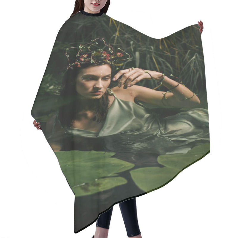 Personality  A Woman In A Flowing Dress Adorned With A Floral Crown, Poses Near A Swamp With Lily Pads. Hair Cutting Cape