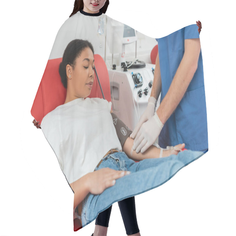 Personality  Doctor In Latex Gloves Sticking Band-aid On Arm Of Multiracial Woman Sitting On Medical Chair And Donating Blood Near Automated Transfusion Machine Hair Cutting Cape