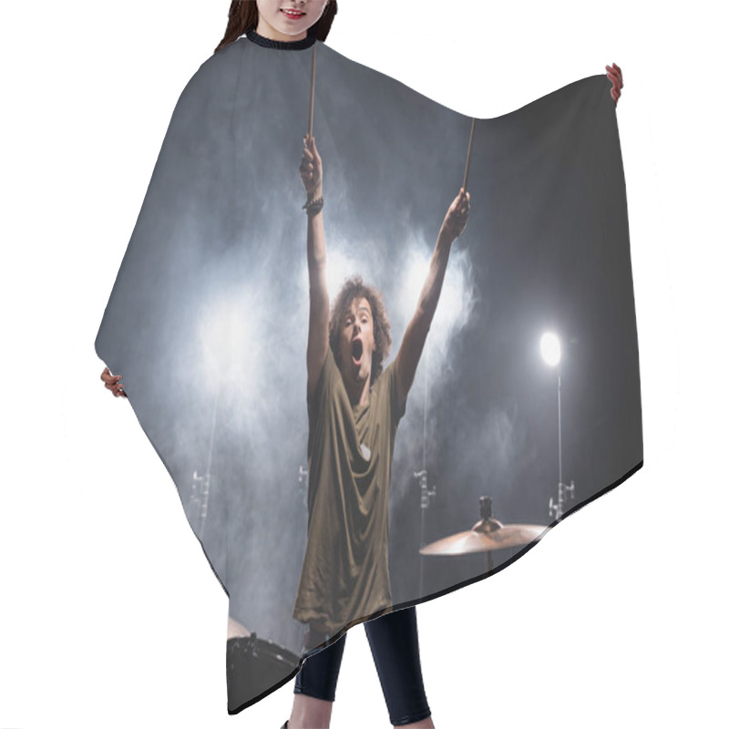 Personality  Shouting Musician With Hands In Air Sitting At Drum Kit With Smoke And Backlit On Background Hair Cutting Cape