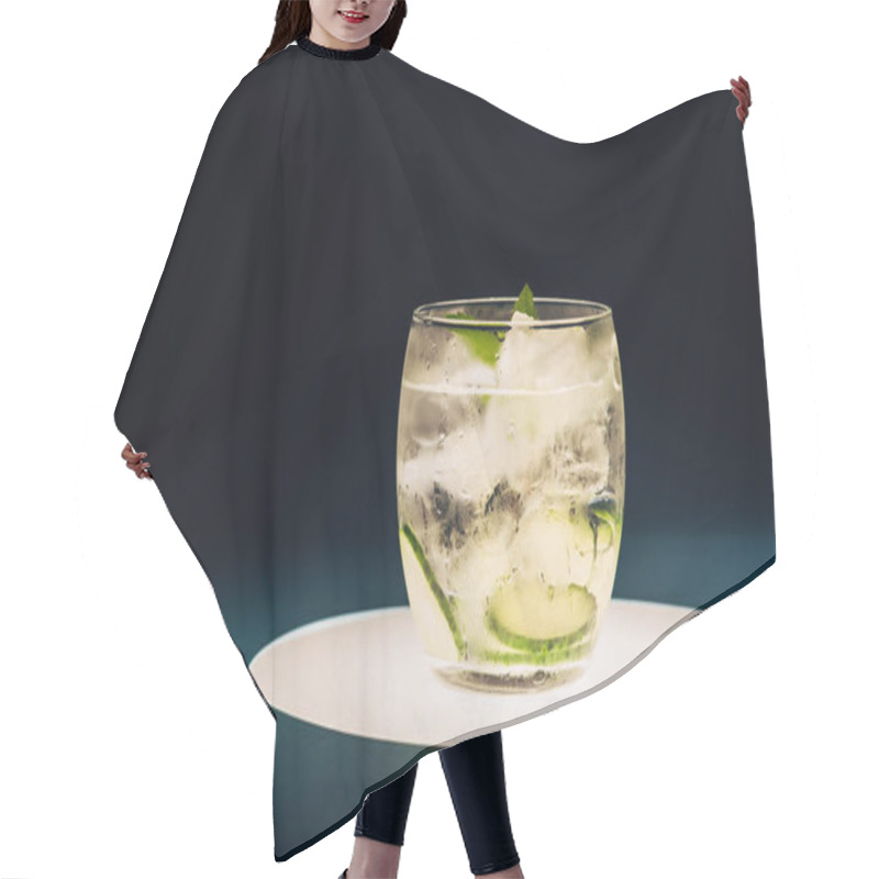 Personality  Refreshing Lemonade With Mint, Cucumber And Ice On Illuminated Circle Isolated On Black Hair Cutting Cape