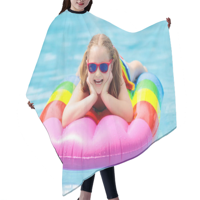 Personality  Child On Inflatable Float In Swimming Pool.  Hair Cutting Cape