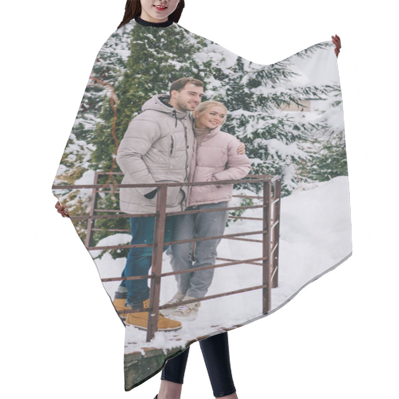 Personality  Happy Couple Standing And Hugging In Cold Winter Park  Hair Cutting Cape