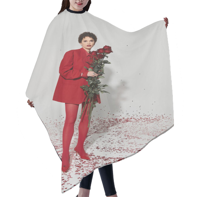 Personality  A Young Woman Stands Confidently In A Vibrant Red Outfit, Surrounded By Rose Petals. Hair Cutting Cape