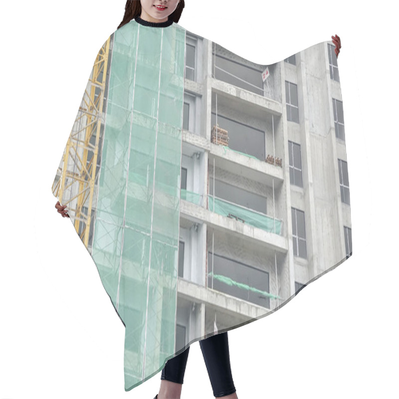 Personality  High Rise Condominium Buildings Construction Site. Hair Cutting Cape