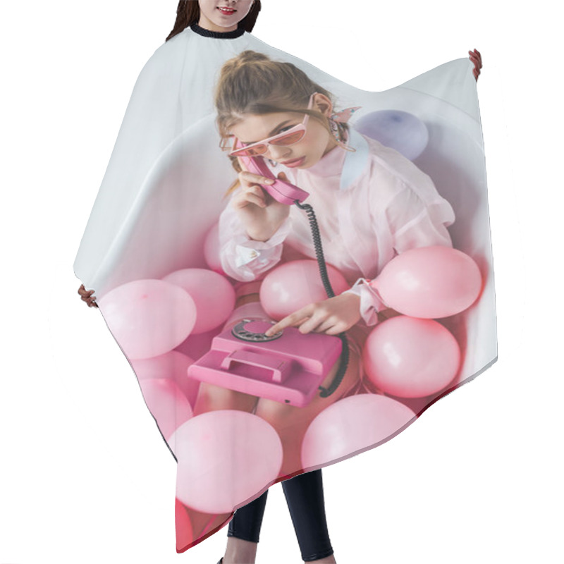 Personality  Overhead View Of Girl In Sunglasses Talking On Pink Retro Phone While Lying In Bathtub With Air Balloons On White  Hair Cutting Cape