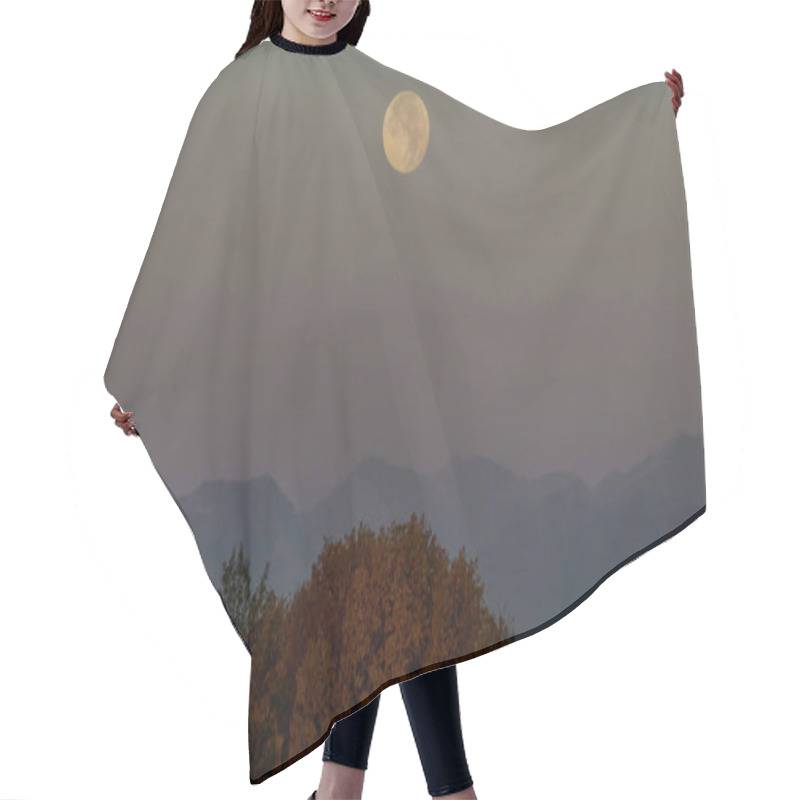 Personality  A Full Moon Rises Above A Serene Mountain Landscape At Dusk. Hair Cutting Cape