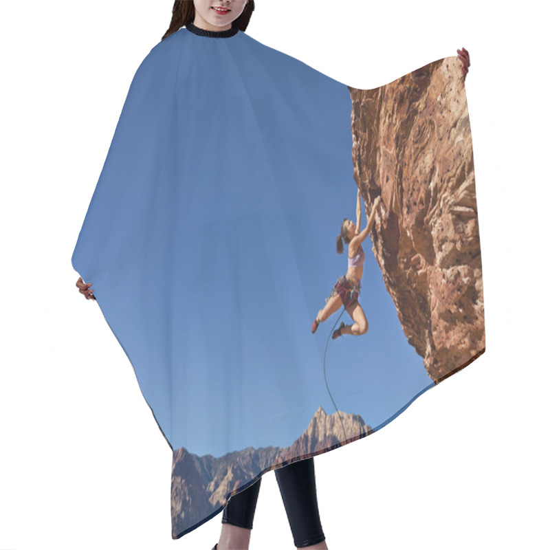 Personality  Female Rock Climber Clinging To A Cliff. Hair Cutting Cape