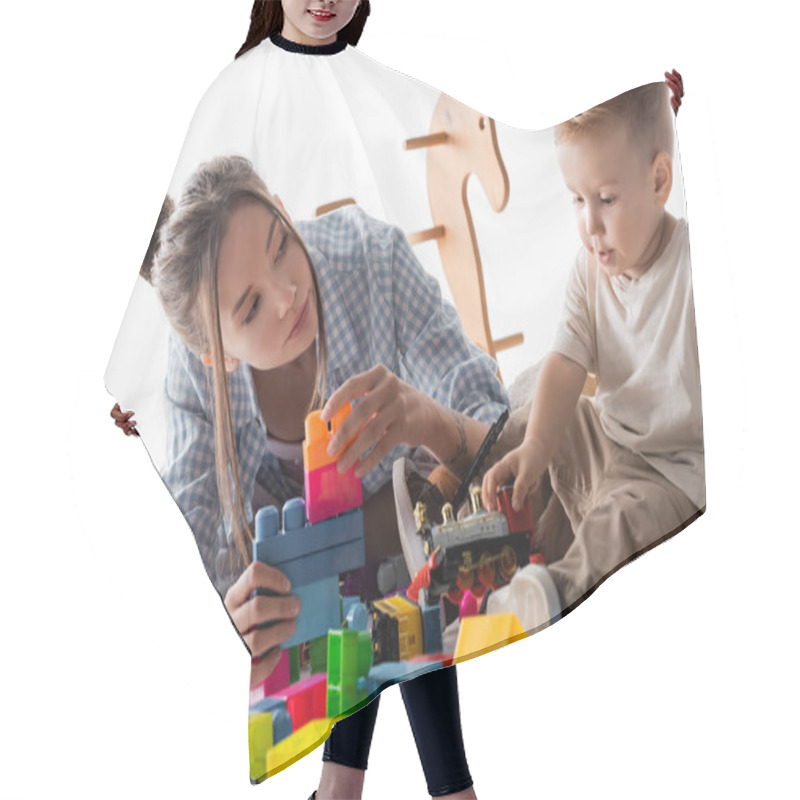 Personality  Mother And Son Playing With Building Blocks And Toy Train On White Hair Cutting Cape