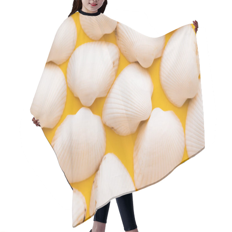 Personality  Top View Of White Seashells On Yellow Background  Hair Cutting Cape