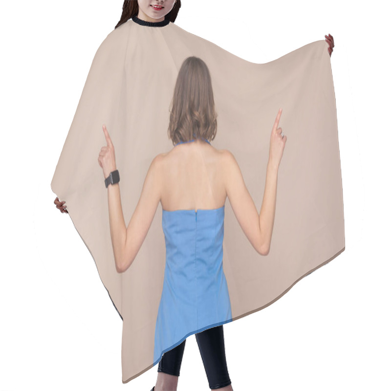 Personality  Back View Of Businesswoman In Blue Dress Pointing Fingers Up On Light Brown Background Hair Cutting Cape