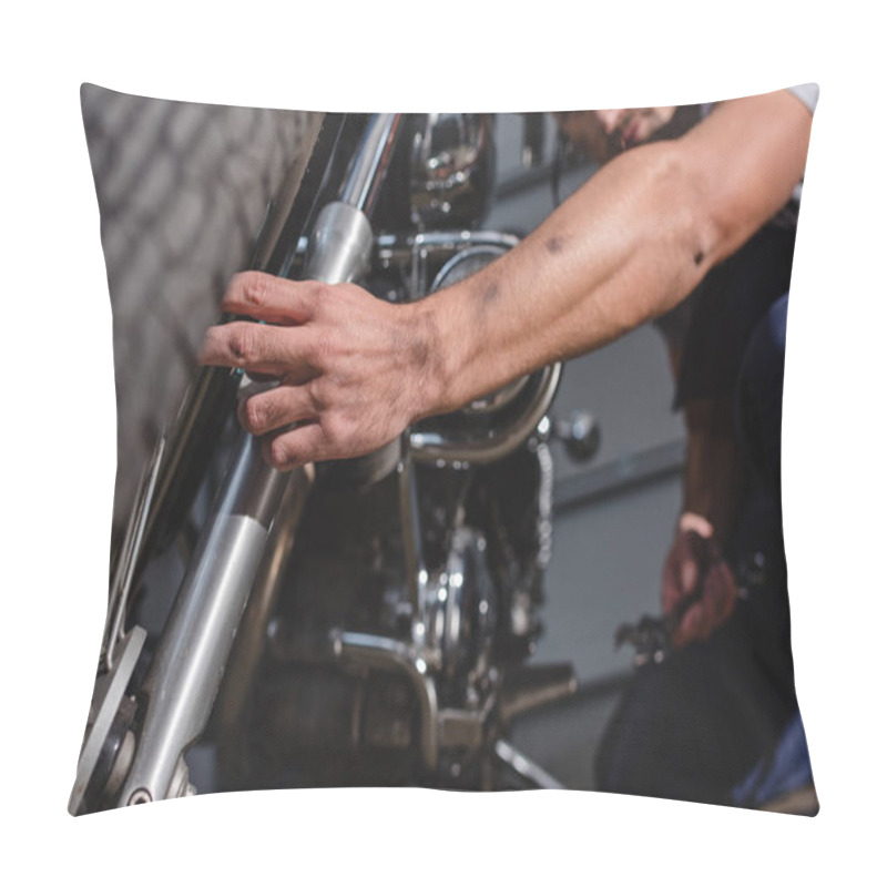 Personality  Closeup Of Mechanic Fixing Motorbike Front Wheel In Garage Pillow Covers