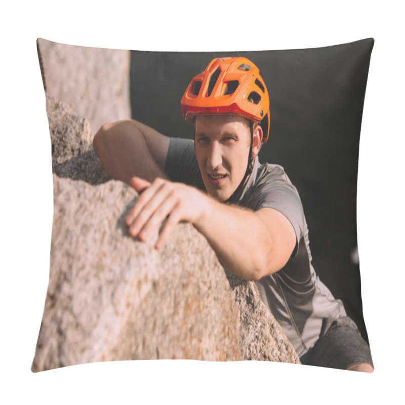 Personality  Handsome Young Traveller In Helmet Climbing On Rock And Looking At Camera Pillow Covers