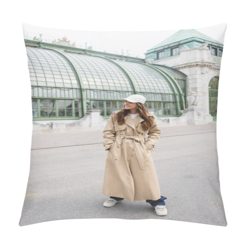 Personality  Happy Young Woman In Trench Coat And Baseball Cap Standing With Hands In Pockets On Rooftop Of European Building  Pillow Covers