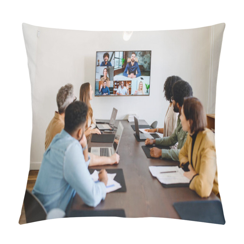 Personality  Team Engaged In A Virtual Meeting With A Display Screen, Showing Both Remote Participants And In-person Colleagues Interacting Seamlessly, Integration Of Modern Technology In Collaborative Workspaces Pillow Covers