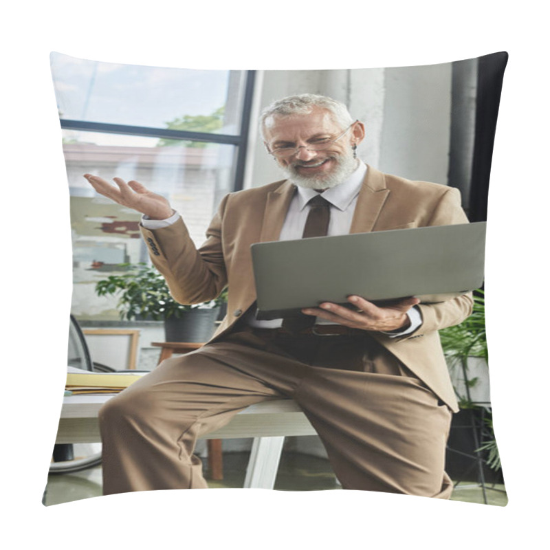 Personality  A Mature Man With A Beard Sits At A Desk, Holding A Laptop While Smiling And Gesturing With His Hand. Pillow Covers