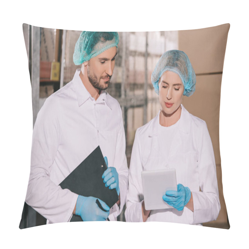 Personality  Handsome Storekeeper Holding Clipboard Near Attractive Colleague Using Digital Tablet Pillow Covers