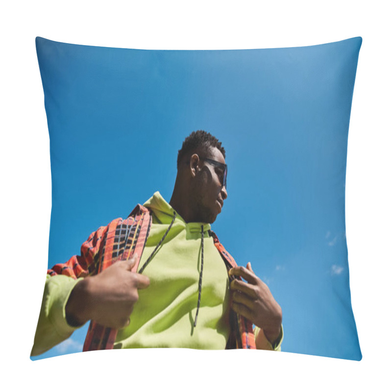 Personality  A Fashionable Young African American Man In A Yellow Jacket Stands Before A Vibrant Blue Sky. Pillow Covers