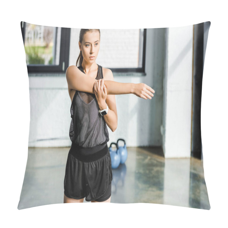 Personality  Concentrated Sportswoman Doing Stretching Exercise Before Training Session At Fitness Studio Pillow Covers