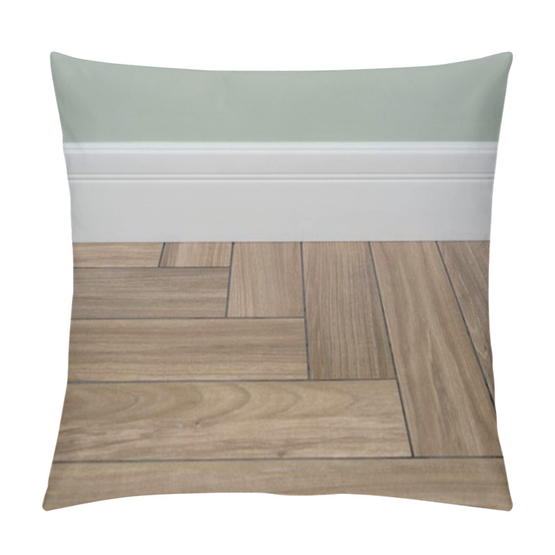 Personality  Interior Concept. Light Matte Wall, White Baseboard And Tiles Immitating Hardwood Flooring Pillow Covers