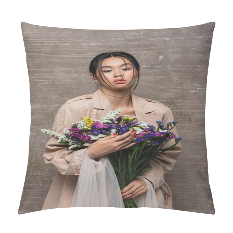 Personality  Fashionable Asian Model In Trench Coat Holding Bouquet On Abstract Brown Background  Pillow Covers