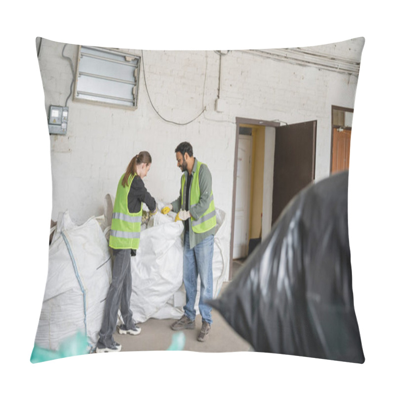 Personality  Side View Of Young Worker In High Visibility Vest And Gloves Standing Near Sacks And Indian Colleague While Working In Waste Disposal Station, Garbage Sorting And Recycling Concept Pillow Covers