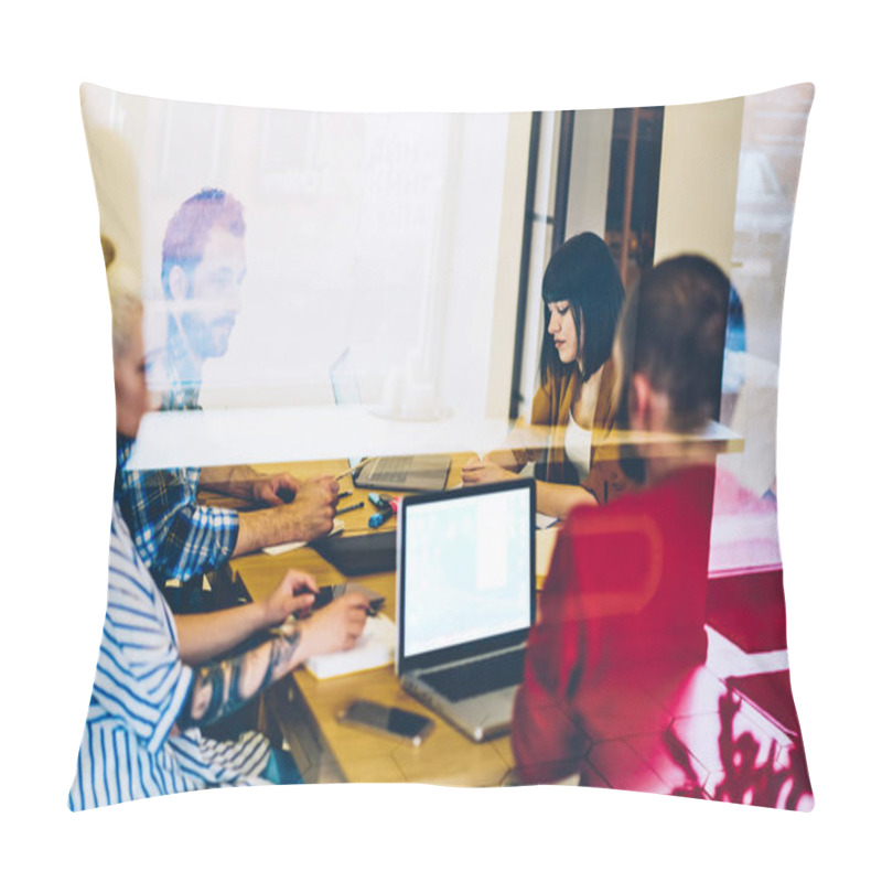 Personality  Group Of Young People In Smart Casual Wear Discussing Cooperative Plan During Briefing Sitting At Meeting Table In Office Behind Glass Wall.Team Of Designers Collaborating On Creative Project Pillow Covers