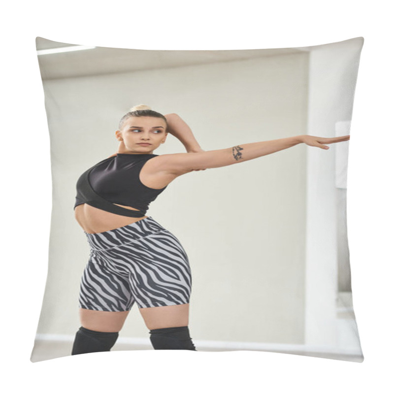 Personality  A Graceful Dancer Stretches Her Body And Arms In Vibrant Zebra Shorts And A Black Top, Flexibility Pillow Covers