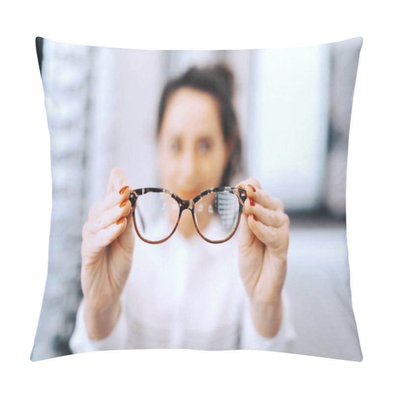 Personality  Woman Holding Eyeglasses At Ophthalmologist Store Selective Focus On Eyeglasses. Pillow Covers