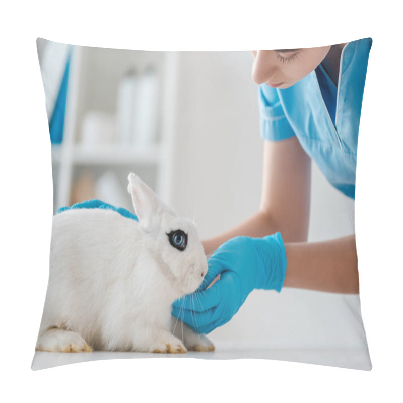 Personality  Young, Attentive Veterinarian Examining Cute White Rabbit Sitting On Table Pillow Covers