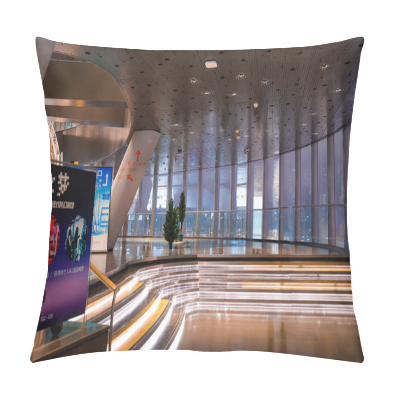 Personality  A Sleek Interior In Shanghai Features A Curved Metallic Ceiling, Illuminated Staircase, And Large Windows Showcasing The Cityscape, With A Tech Focused Sign. Pillow Covers