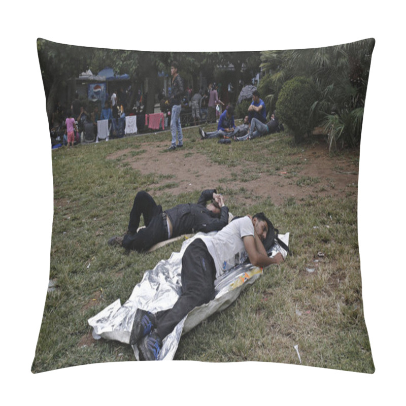 Personality  Migrants Try To Shelter Themselves During A Rain Storm In Victoria Square In Athens, Greece On Sep. 22, 2015. Pillow Covers