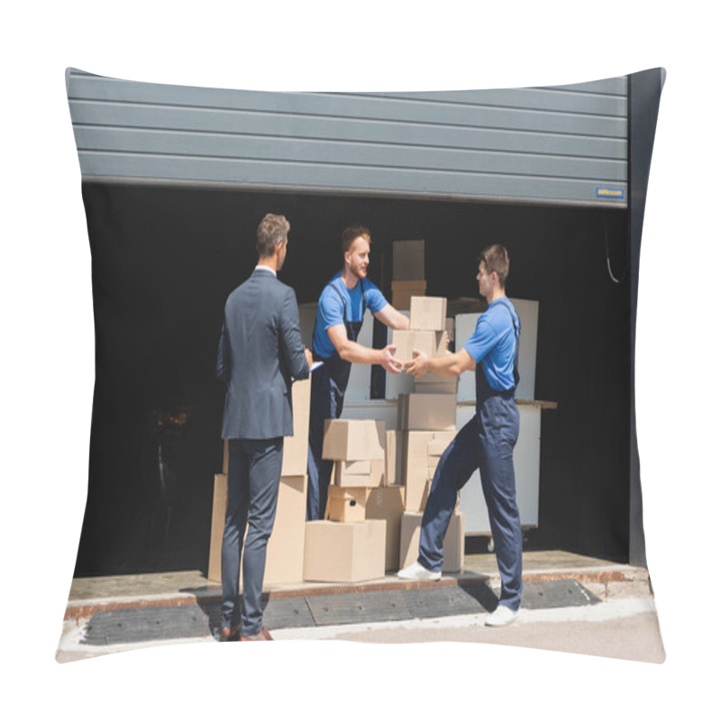 Personality  Businessman With Clipboard Standing Near Movers Holding Cardboard Boxes In Warehouse Outdoors  Pillow Covers