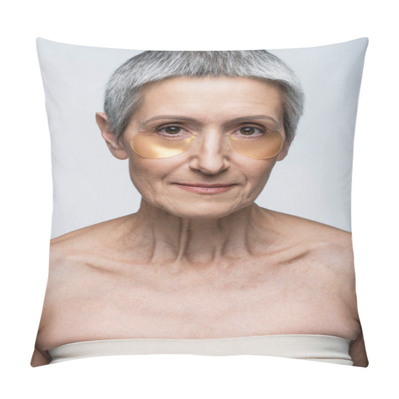 Personality  Middle Aged Woman In Golden Eye Patches Looking At Camera Isolated On Grey Pillow Covers