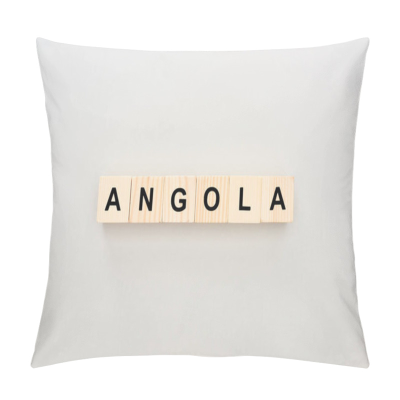 Personality  Top View Of Wooden Blocks With Angola Lettering On White Background Pillow Covers