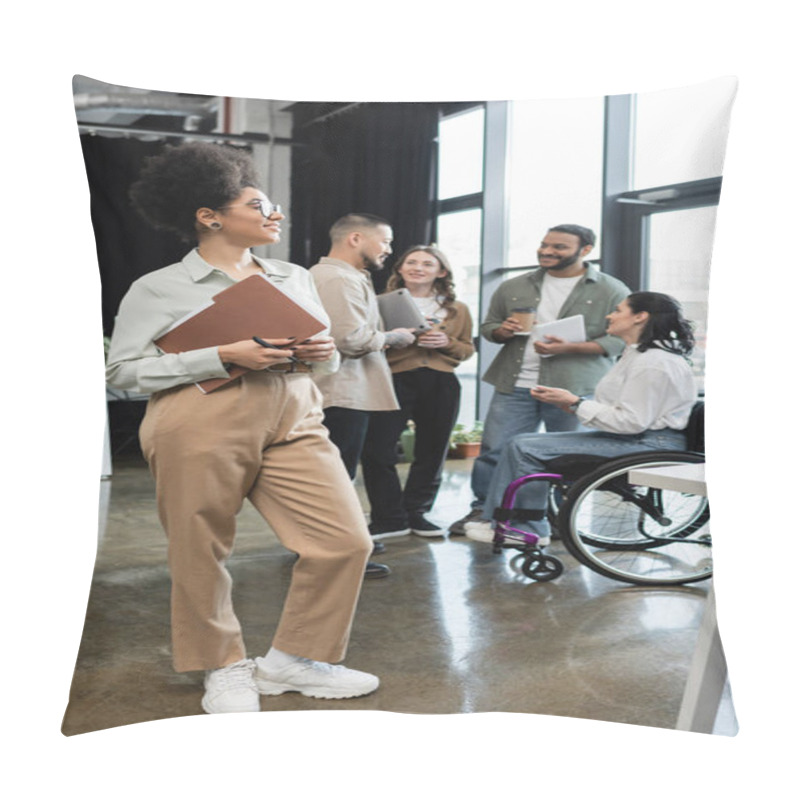 Personality  Pleased African American Woman Holding Folder And Standing Near Interracial Team In Coworking Pillow Covers