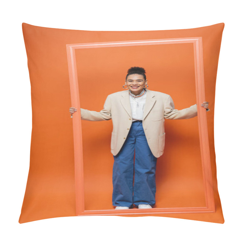 Personality  Cheerful Attractive Woman In Blazer And Blue Pants Holding Orange Framework On Orange Backdrop Pillow Covers