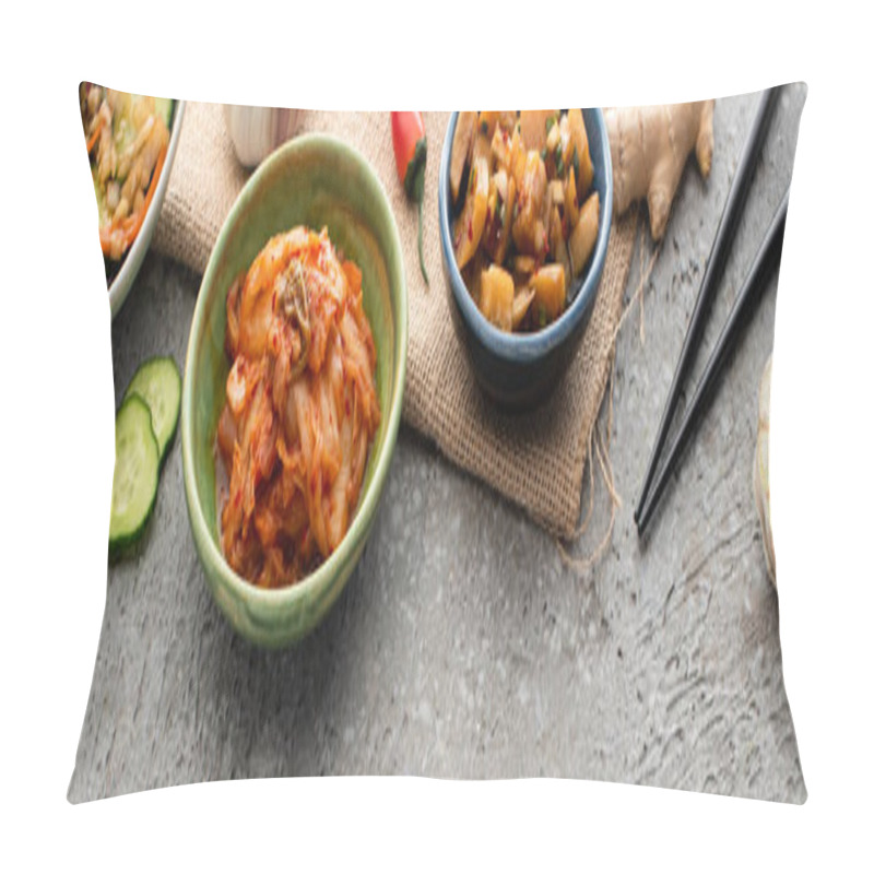 Personality  Panoramic Shot Of Bowls With Kimchi Near Chopsticks, Ginger, Chili Pepper, Sliced Cucumber And Garlic On Concrete Surface  Pillow Covers