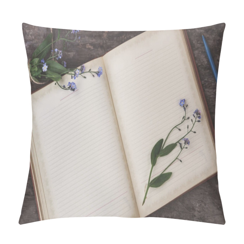 Personality  On An Old Wooden Background Lies An Old Notebook And A Bouquet O Pillow Covers