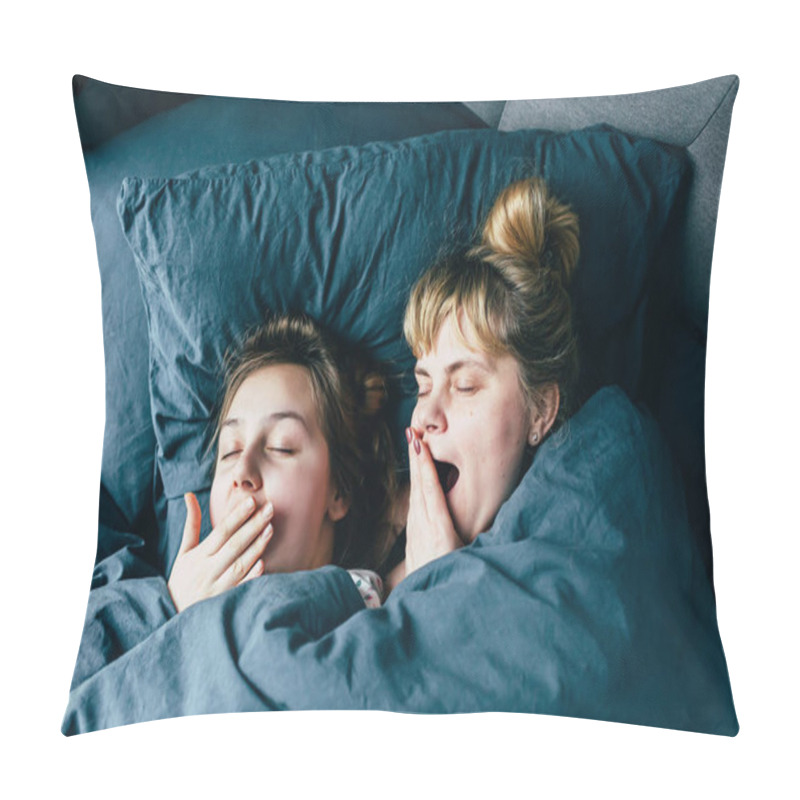 Personality  Portrait Of Light Hair Long Hair Mother And Daughter On Pillow Under The Duvet Together Yawn In Soft Sleepy Morning Light On Blue Linen Bed. Concept Of Happy Family Living, Relaxation, Comfort, Fun.  Pillow Covers