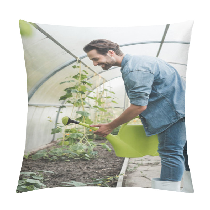 Personality  Side View Of Smiling Farmer Watering Garden Beds In Greenhouse Pillow Covers