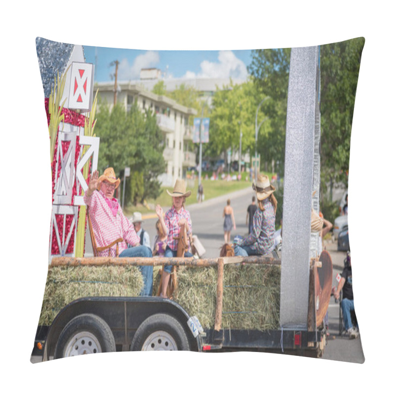 Personality  Williams Lake, British Columbia/Canada - July 2, 2016: People In Western Dress Wave To The Crowds From Their Farm Themed Parade Float At The Annual Stampede Parade In Downtown Williams Lake. Pillow Covers