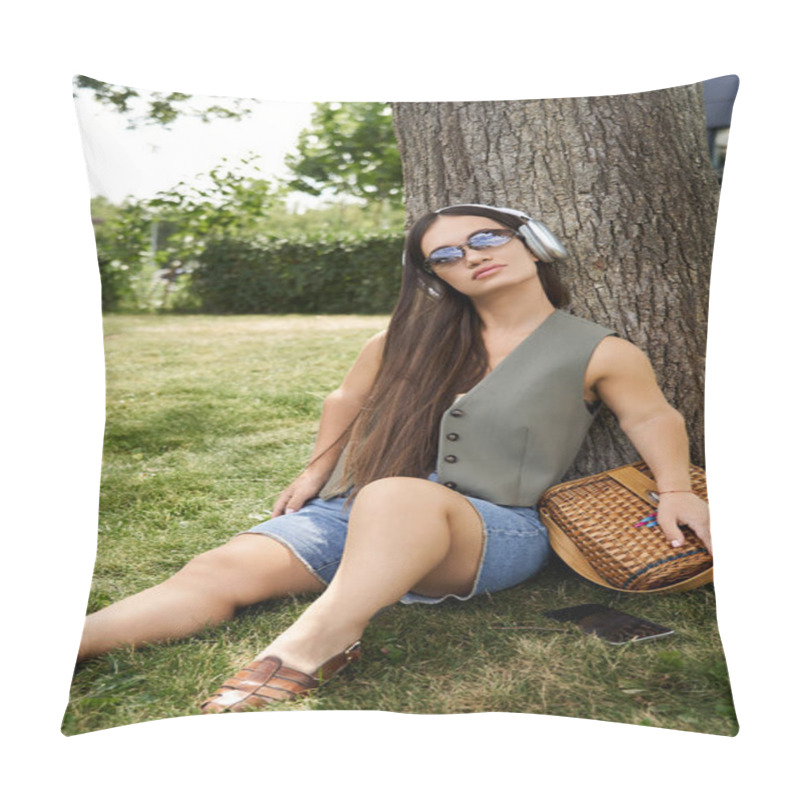 Personality  A Young Woman With Short Stature Enjoys A Peaceful Moment Outdoors, Sitting Against A Tree In Casual Attire, Lost In Her Music. Pillow Covers