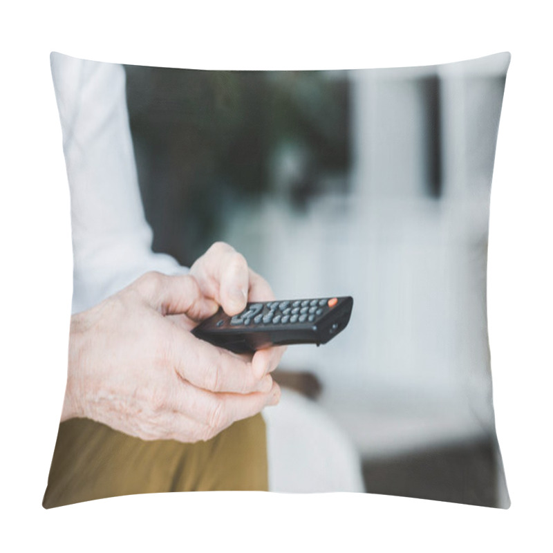 Personality  Cropped View Of Senior Man Holding Remote Control In Hands Pillow Covers