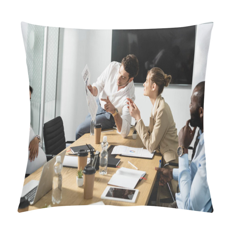 Personality  Businessman Pointing At Article In Newspaper During Meeting With Multicultural Colleagues Pillow Covers