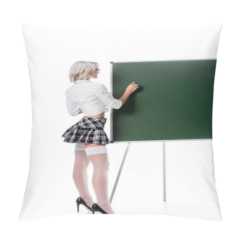 Personality  Blond Woman In Seductive School Uniform And Stockings Writing On Empty Chalkboard Isolated On White Pillow Covers