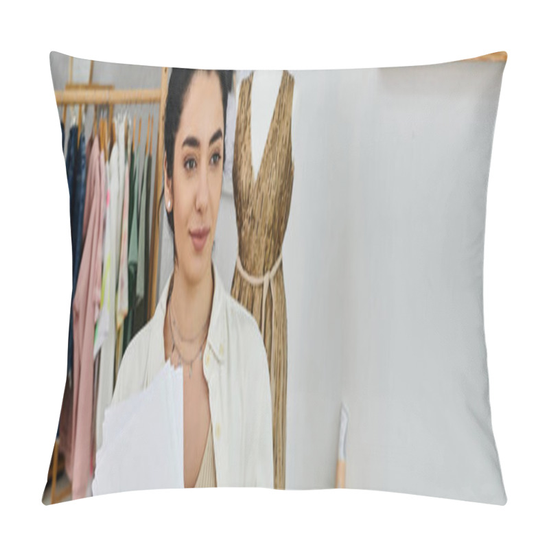 Personality  Woman In Casual Attire Holding Paper In Front Of Rack, Exploring Eco-friendly Fashion Options. Pillow Covers